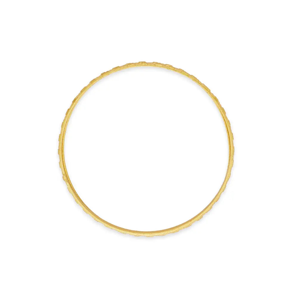 Gold bracelet on a white background