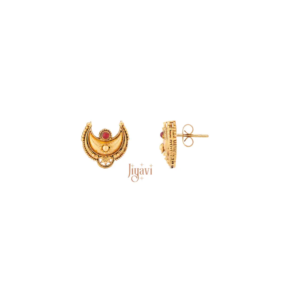Gold earrings with a red gemstone on a white background, branded 'Jiyavi'.