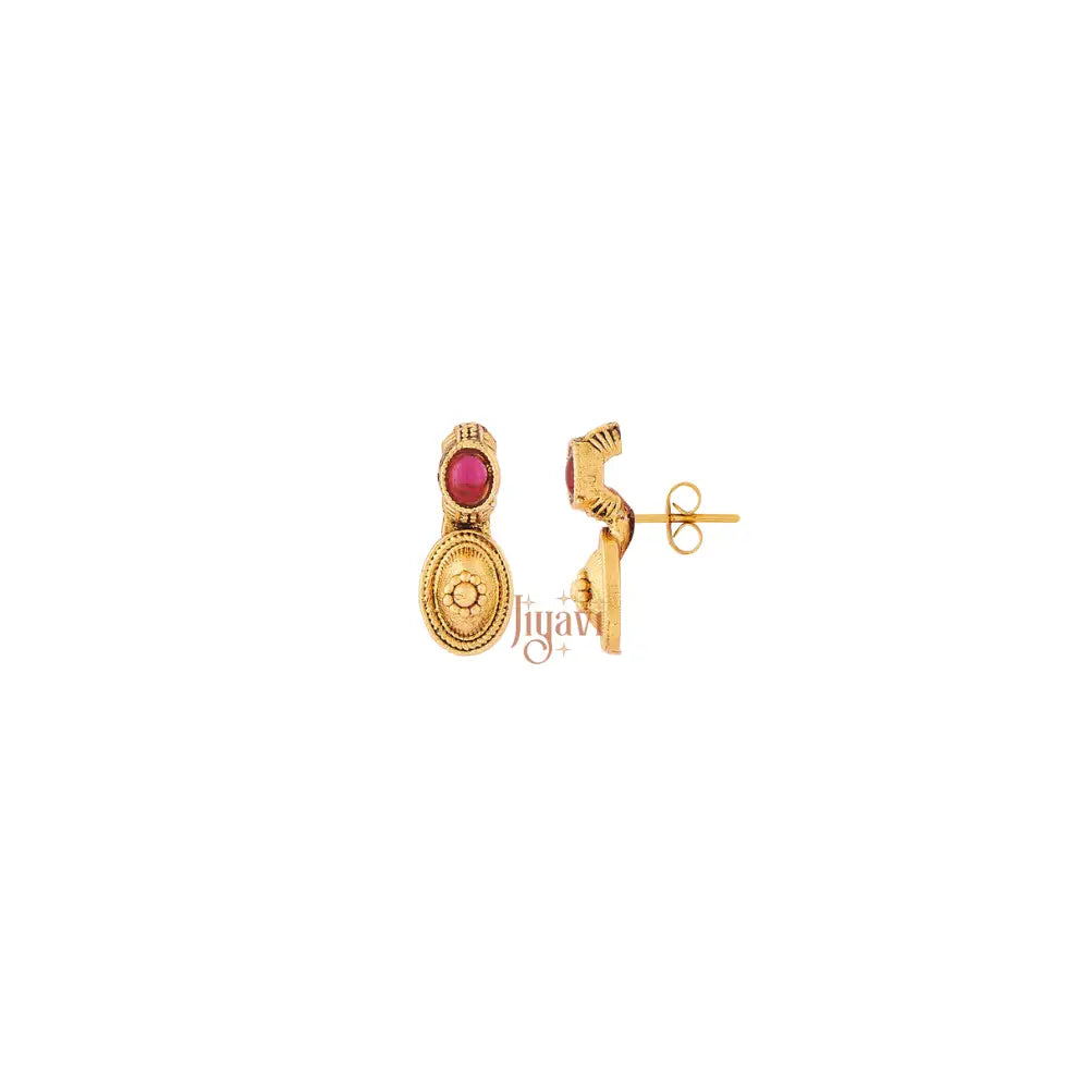 Gold earrings with a red gemstone on a white background, featuring the brand 'Jiyavi'.