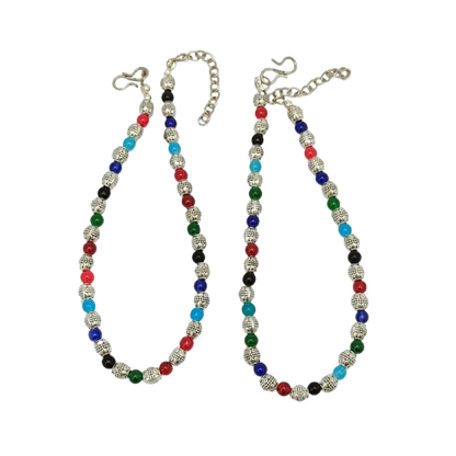 Colorful beaded necklace with silver clasp on a white background