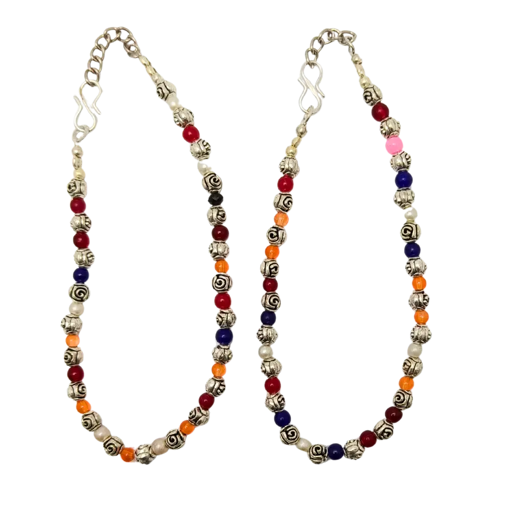 Colorful beaded necklace with silver chain on a white background
