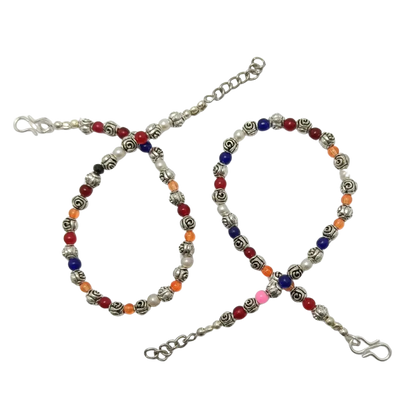 Beaded lanyard with colorful beads and metal clasp on a white background