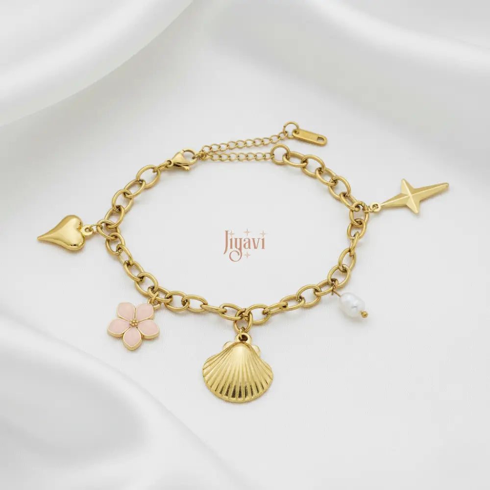 Gold bracelet with charms on a white background, featuring the brand 'Jiguavi'.